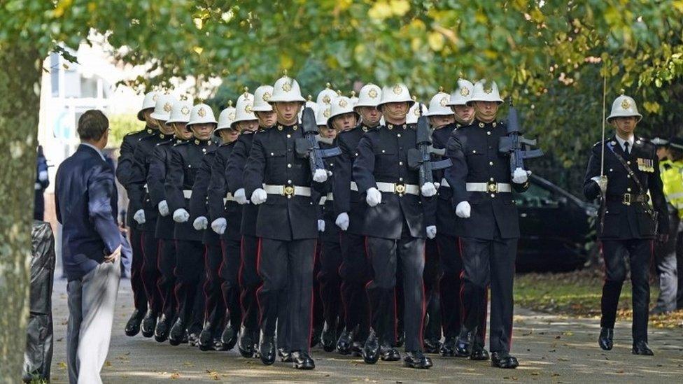 A detachment of Royal Marines arrive for the funeral of Major General Matthew Holmes