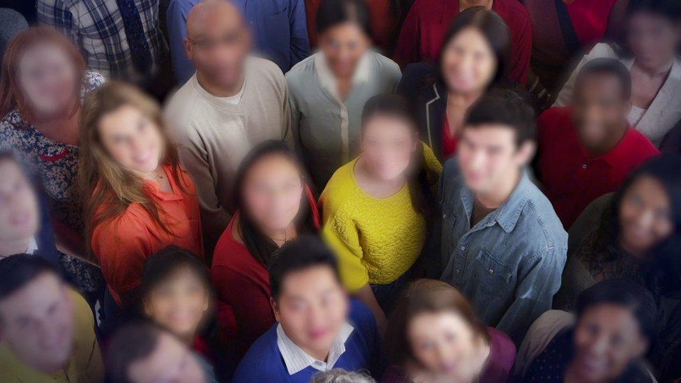 Group of people with blurred faces