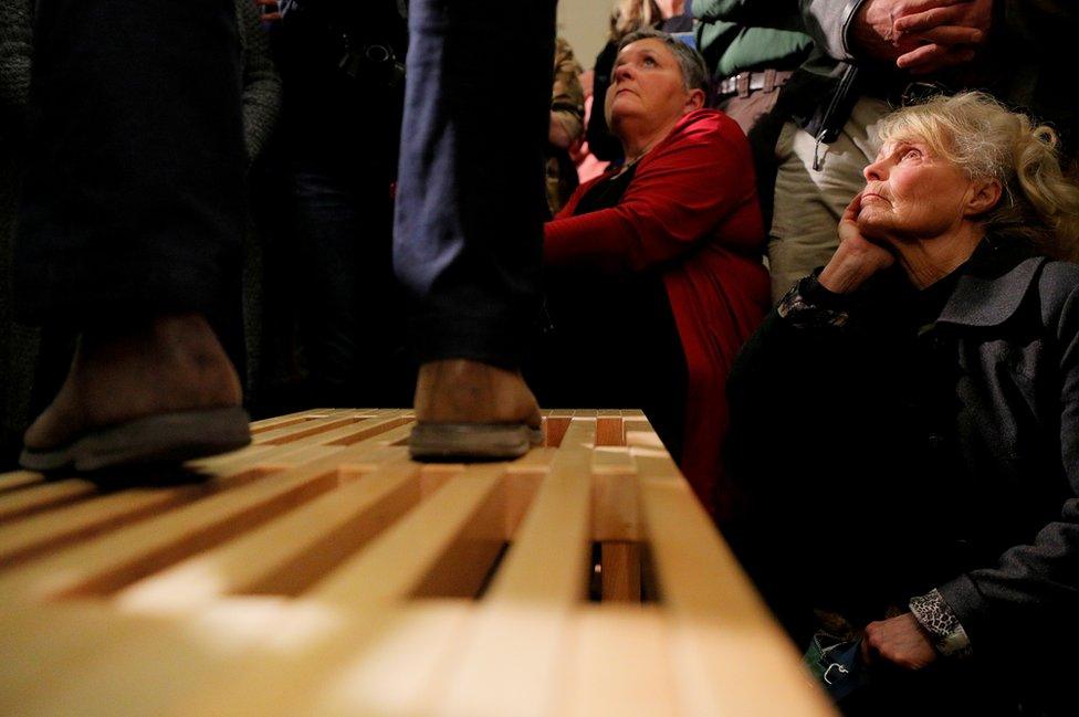 Audience members listen as Democratic 2020 US presidential candidate and former US Representative Beto O'Rourke speaks at a campaign stop at Keene State College in Keene, New Hampshire, 19 March 2019.