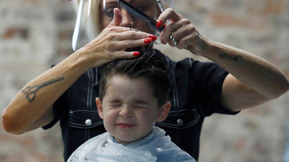 Boy having his hair cut