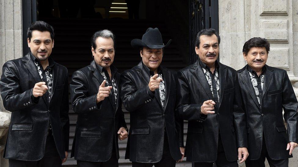 Mexican band Los Tigres del Norte pose before a press conference in Mexico City, on October 7, 2014.