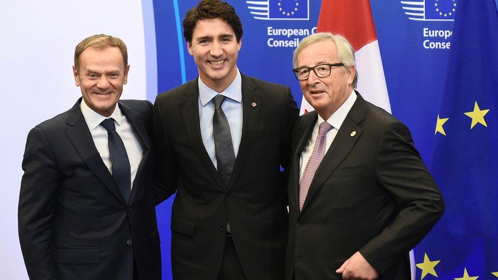 European Council President Donald Tusk, Canadian Prime Minister Justin Trudeau and European Commission President Jean-Claude Juncker