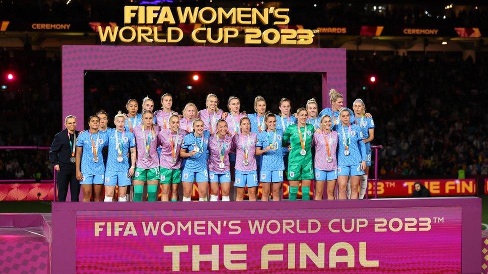 England players pose with their runners up medals at the Women's World Cup Final.