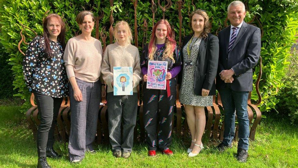 From l to r is Kerry Gibson-Yates, Communications Officer, Healthwatch Herefordshire, Claire Burgoyne, FE Lecturer, Hereford College of Arts, Ruby and Kathy, Hereford College of Arts students, Victoria Major, Health Improvement Coordinator, Herefordshire Council’s Public Health Team, Councillor Ivan Powell, Herefordshire Council’s Cabinet Member for Children and Young People.