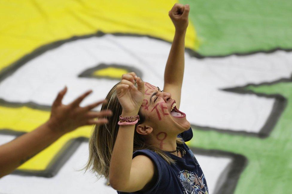 A woman shouts slogans during a protest against President Michel Temer in Sao Paulo, Brazil, Sunday, Sept. 4, 2016.