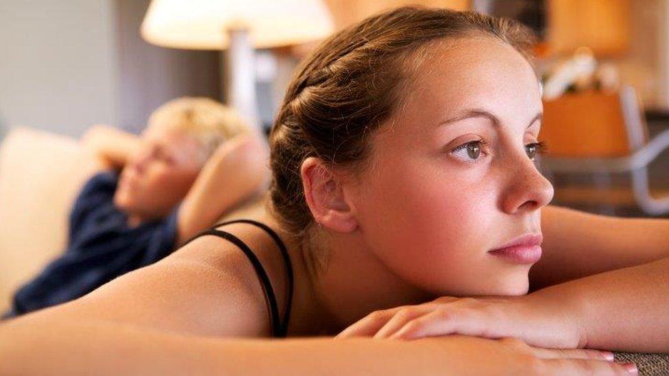 Teenage boy and girl