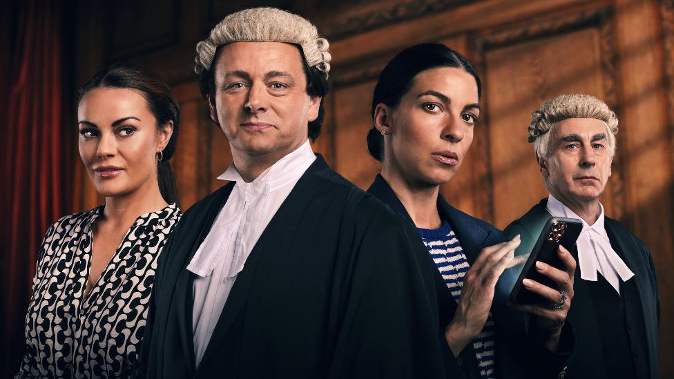 Chanel Cresswell as Coleen Rooney, Michael Sheen as David Sherborne QC, Natalia Tena as Rebekah Vardy and Simon Coury as Hugh Tomlinson QC