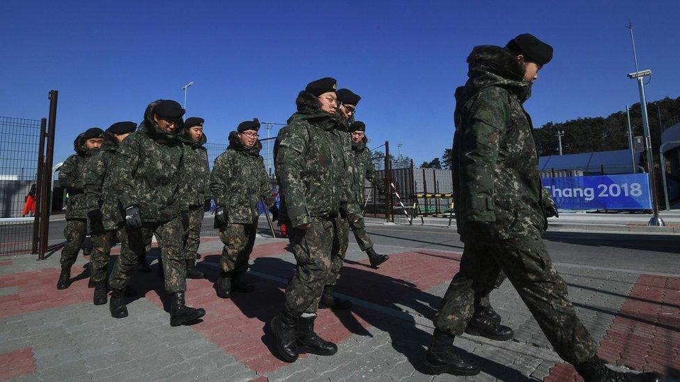 South Korean soldiers arriving at a security checkpoint