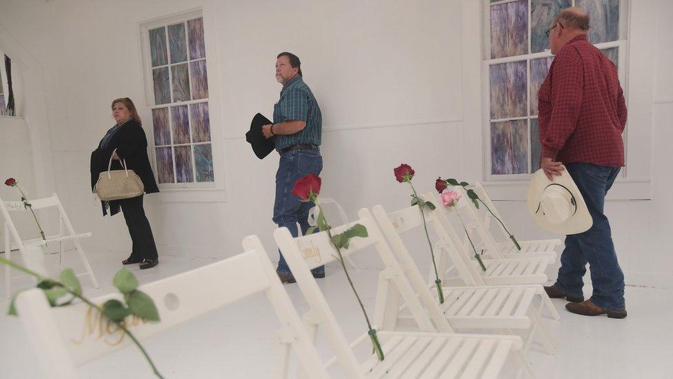 Visitors tour the church