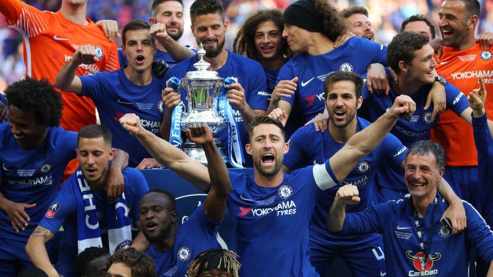 Gary Cahill of Chelsea celebrates with his team mates after winning The Emirates FA Cup Final between Chelsea and Manchester United at Wembley Stadium on May 19, 2018 in London, England.