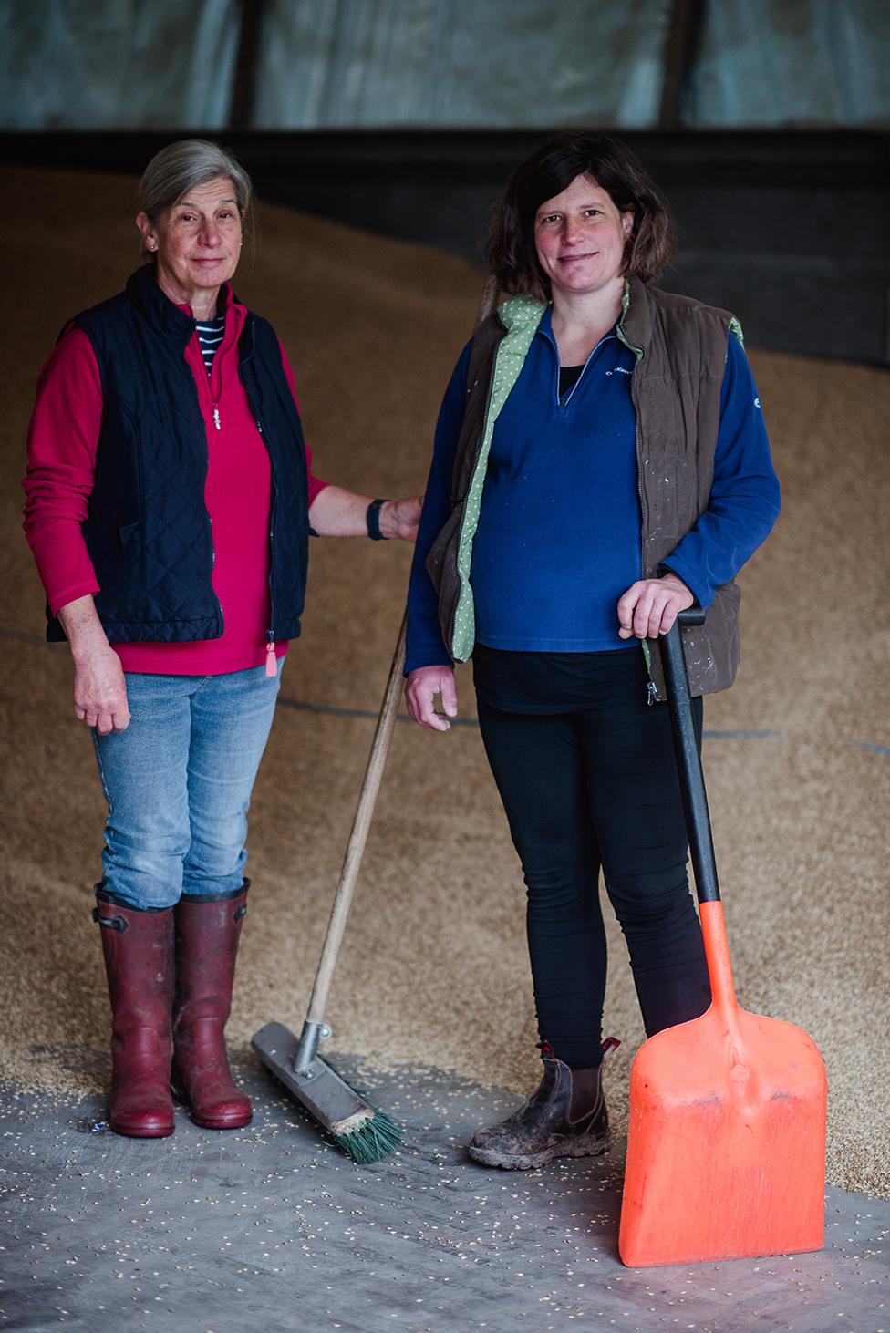 Anna stands with her mother on their farm in north Northumberland