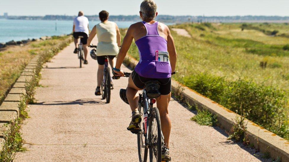 Group of people cycling