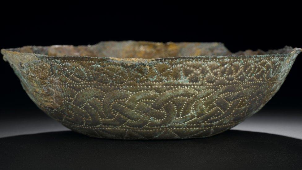 Bowl of silver, decorated with four pairs of grotesque animals, interlocking, Pictish, from St Ninian's Isle, 8th century.jpeg