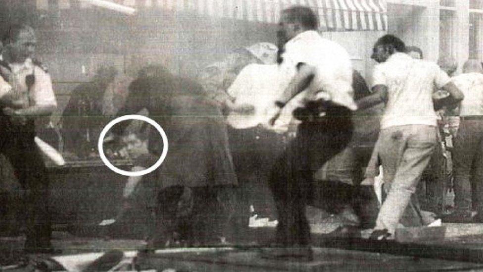 Jonathan Cash (circled) shortly after the explosion