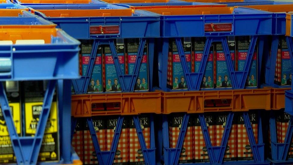 Guernsey Dairy milk crates containing cartons