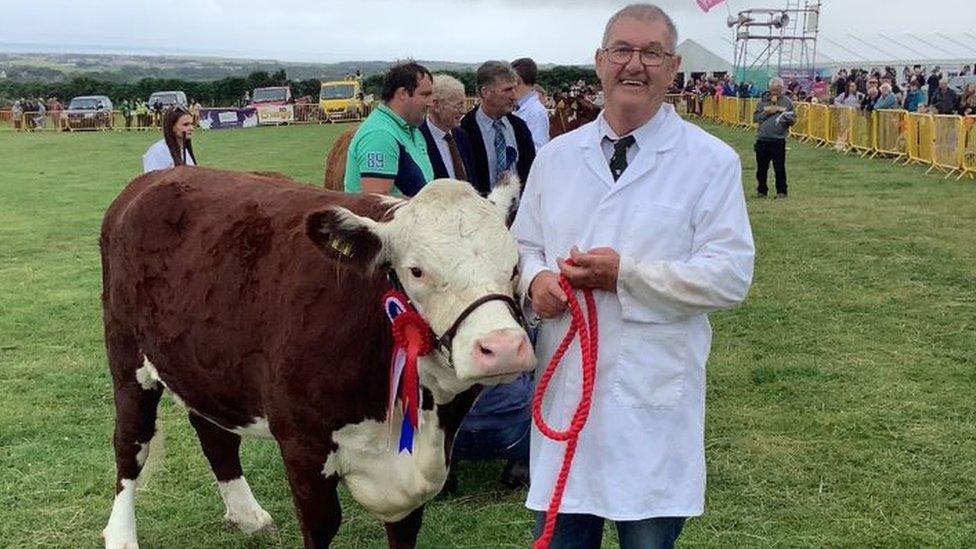 Derek Crellin with his Hereford heifer