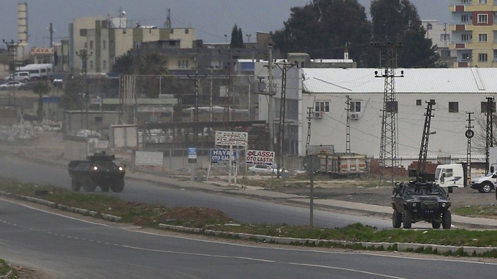 Turkish armoured vehicles patrol at the south-eastern town of Nusaybin, 14 Feb