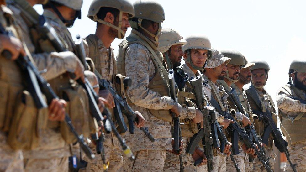 Saudi soldiers at an airfield where military cargo planes land to deliver aid in Marib, Yemen January 26, 2018