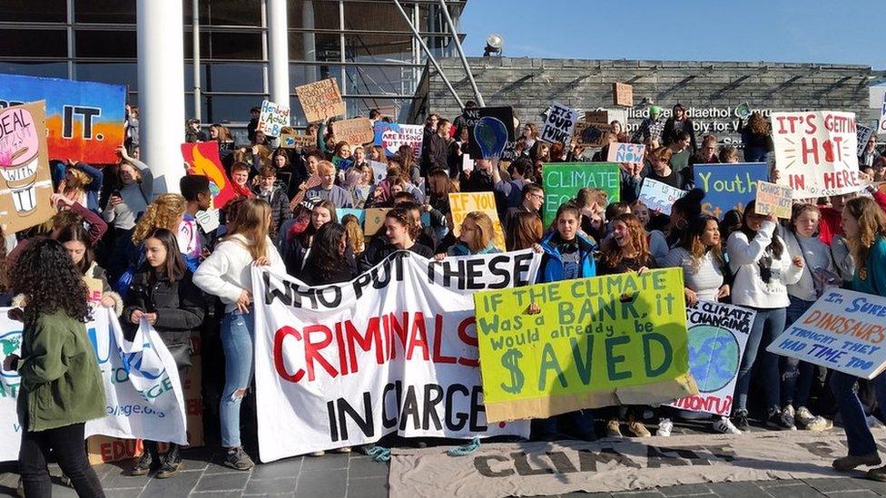 Schoolchildren with banners