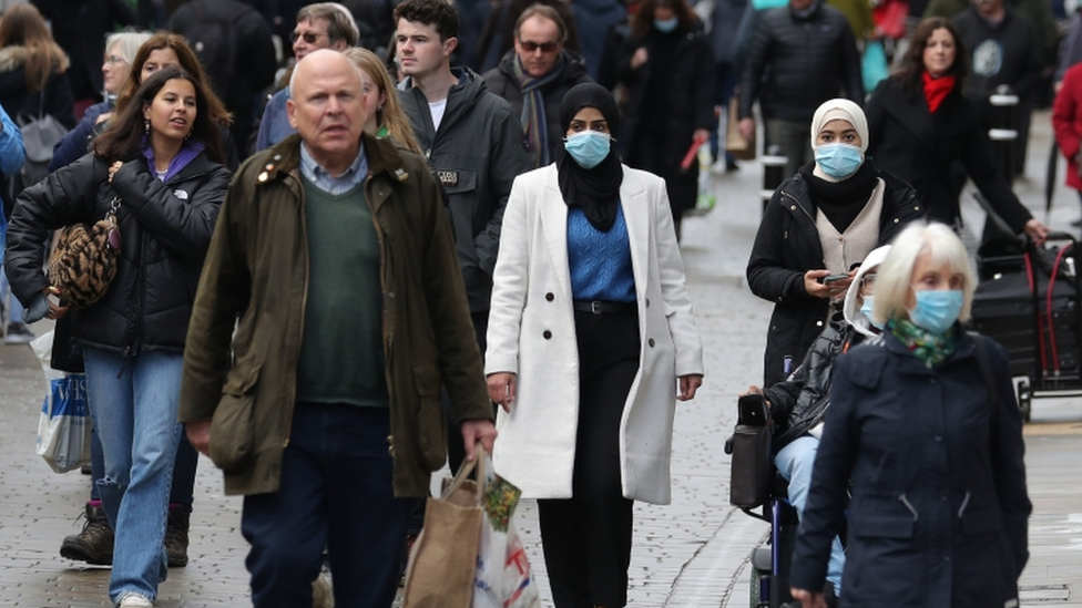 People walking along a high street