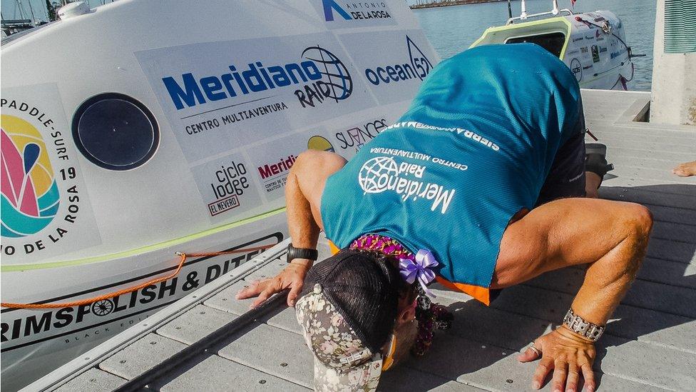 Antonio-de-la-Rosa-kisses-the-ground-on-arrival-at-Honolulu-in-Hawaii-at-the-end-of-his-record-trip-across-the-Pacific-Ocean.