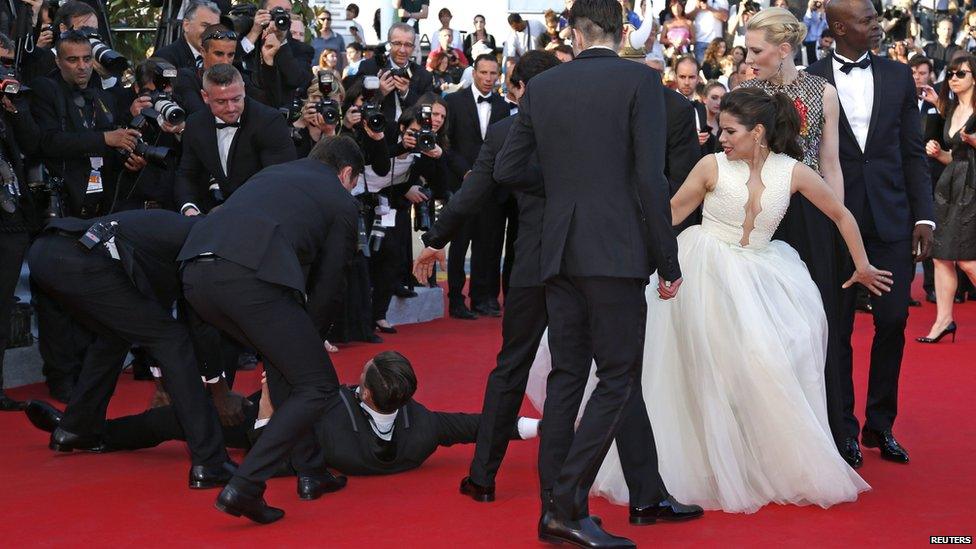 Vitalii Sediuk was arrested after he tried to slip under the dress of actress America Ferrera at the Cannes Film Festival 2014