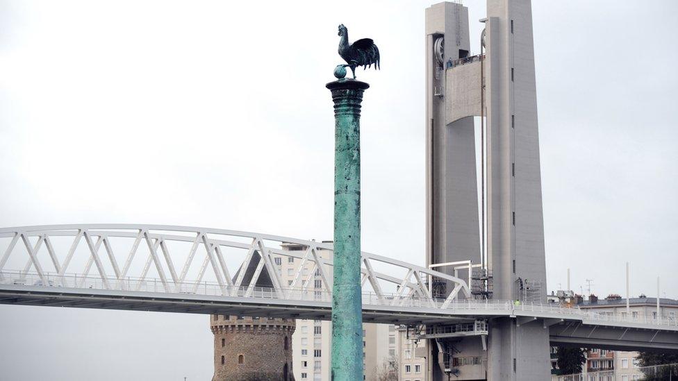 The Algerian canon in the French port of Brest with a statue of a cockerel on top of it