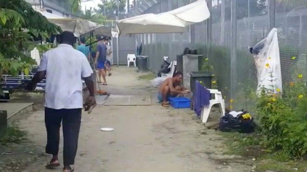 Asylum seekers at a detention centre on Manus Island, Papua New Guinea, in this still image taken from social media video November 3, 2017