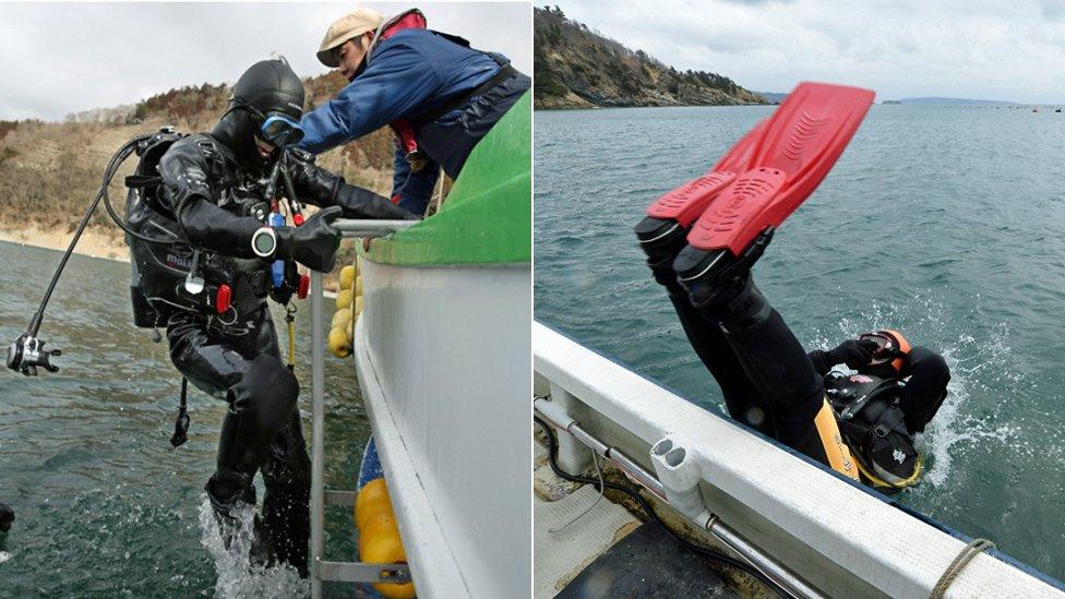 Masaaki Narita and Yasuo Takamatsu get into the water