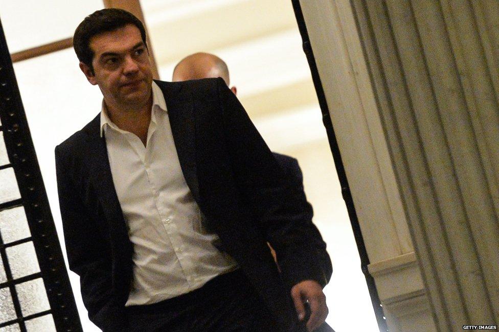 Alexis Tsipras leaving his office