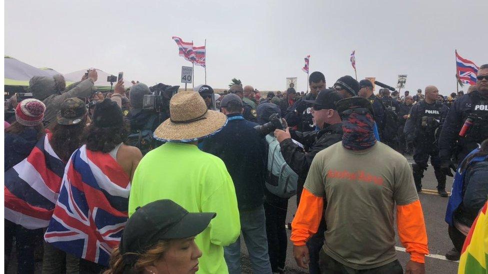 Protesters led by native Hawaiian elders take part in a protest against the building of a giant new telescope