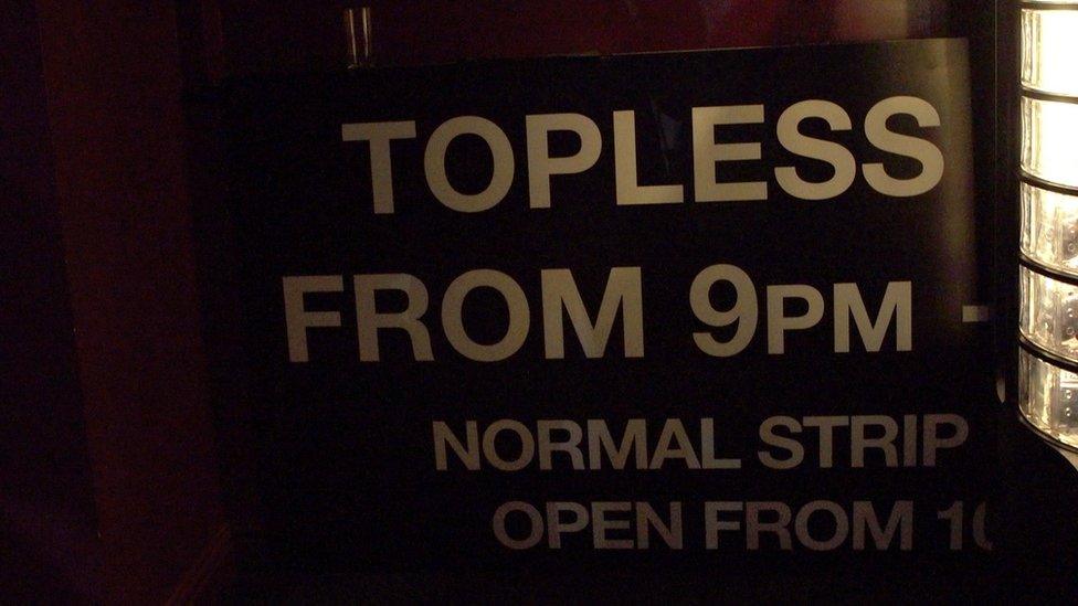 Sign at lap dancing club