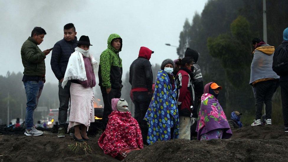 Image shows protesters at road block