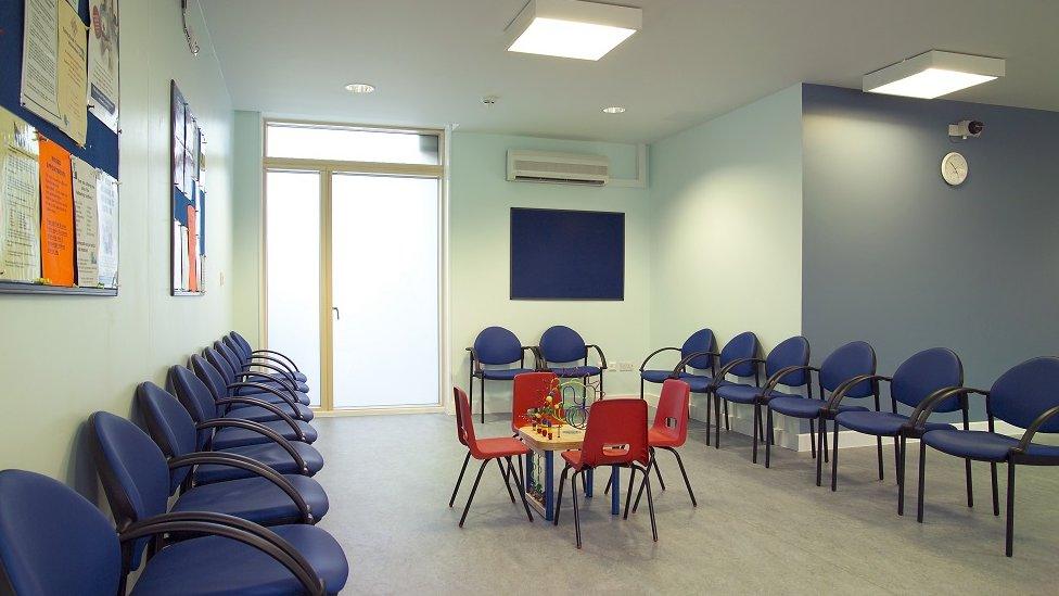 Empty chairs at a hospital waiting room