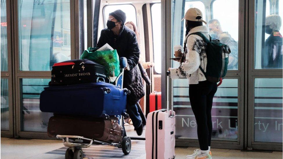 Travellers at a New Jersey airport