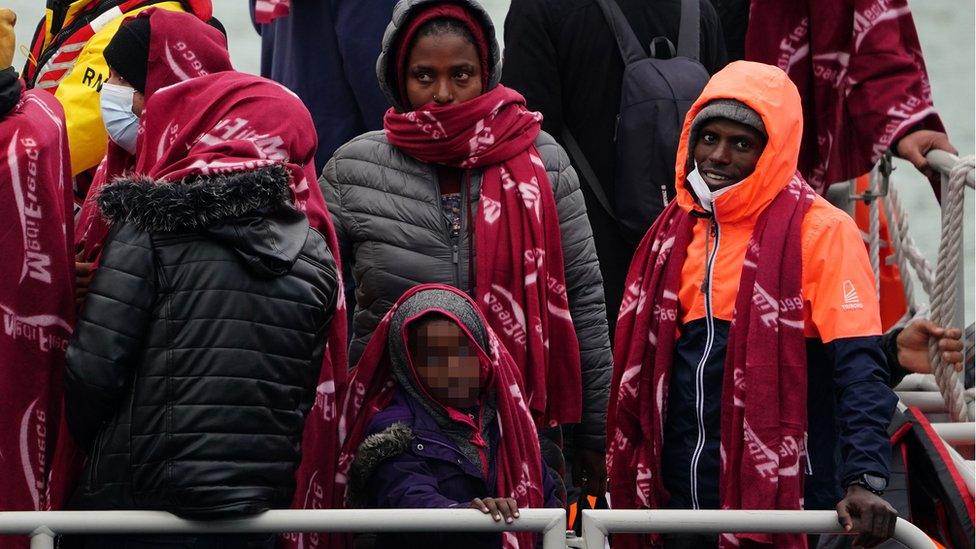 A group of people thought to be migrants arrive in Dover, Kent, after being rescued by the Dover lifeboat