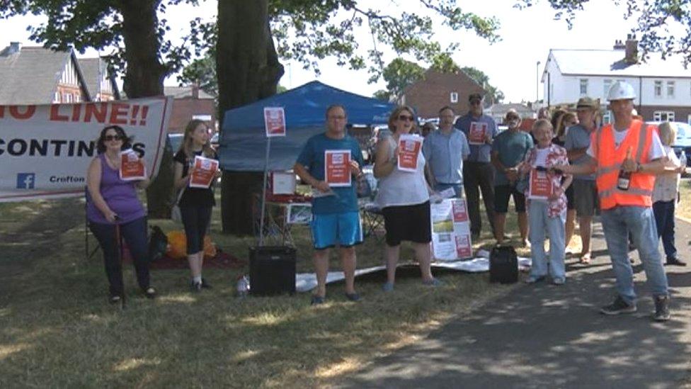 Residents staging the protest