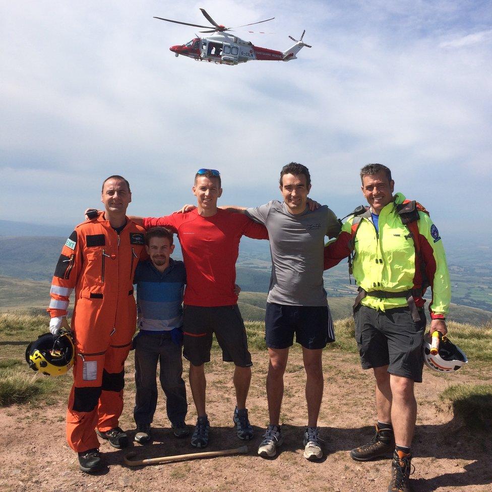 Graham Hatch of HM Coastguard, Rory McCann, Finn McCann, Niall McCann and Mark Jones returning to the site of Mr McCann's accident