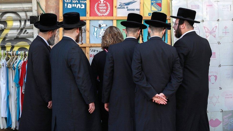 Ultra-Orthodox Jews at a market in Jerusalem in December 2019