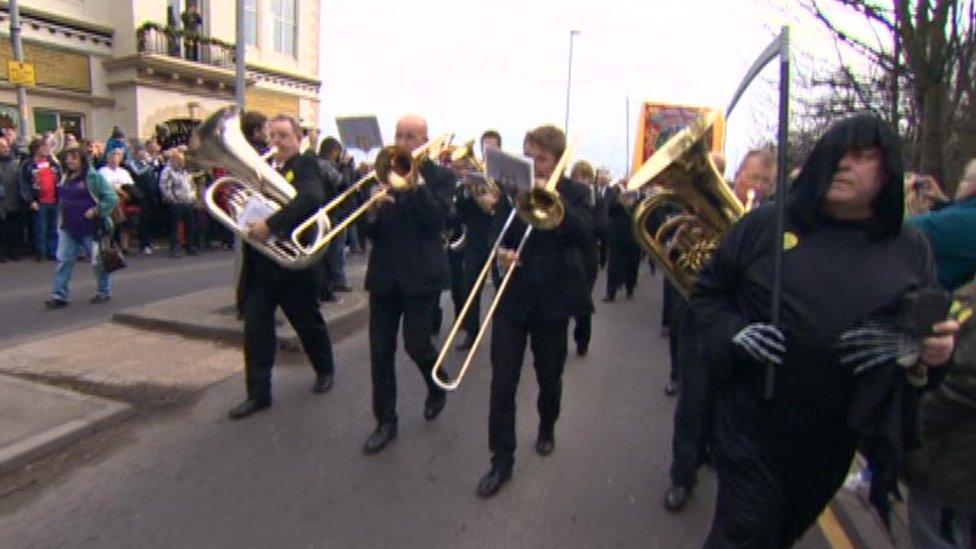 The procession was led by a Grim Reaper figure and the Knottingley Silver Band