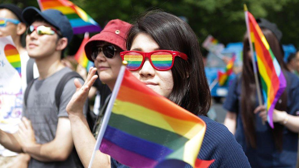 People attend a pride event in Tokyo in May 2016