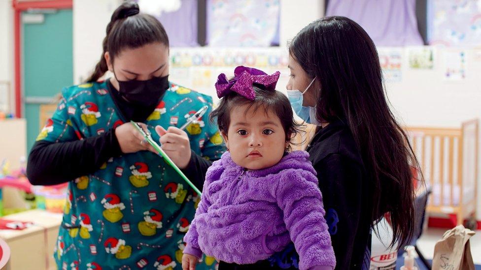 A student with a baby at school