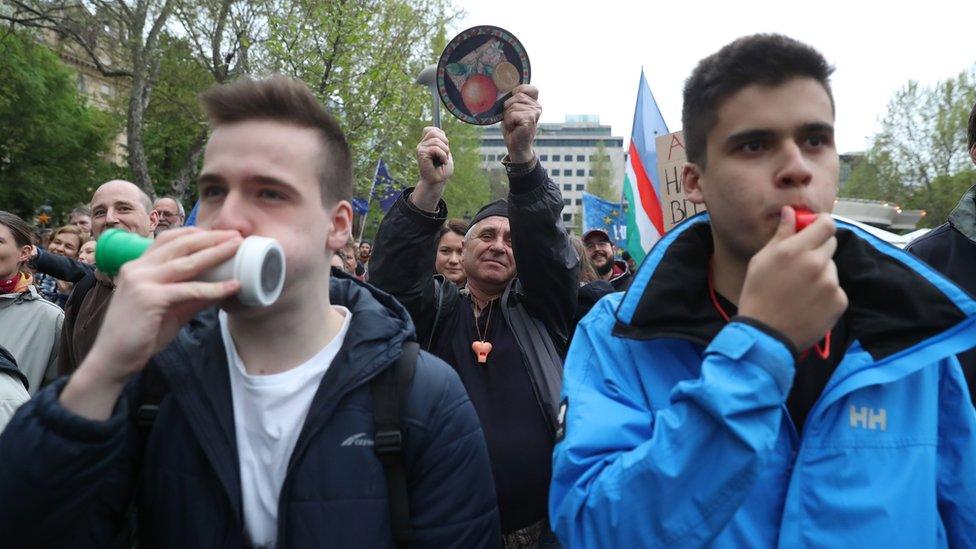 Demonstrators protest against Hungarian Prime Minister Viktor Orban's government in front of the former building of Hungarian Television on April 15, 2017 in Budapest