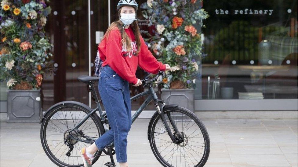 A cyclist wearing a facemask in Edinburgh