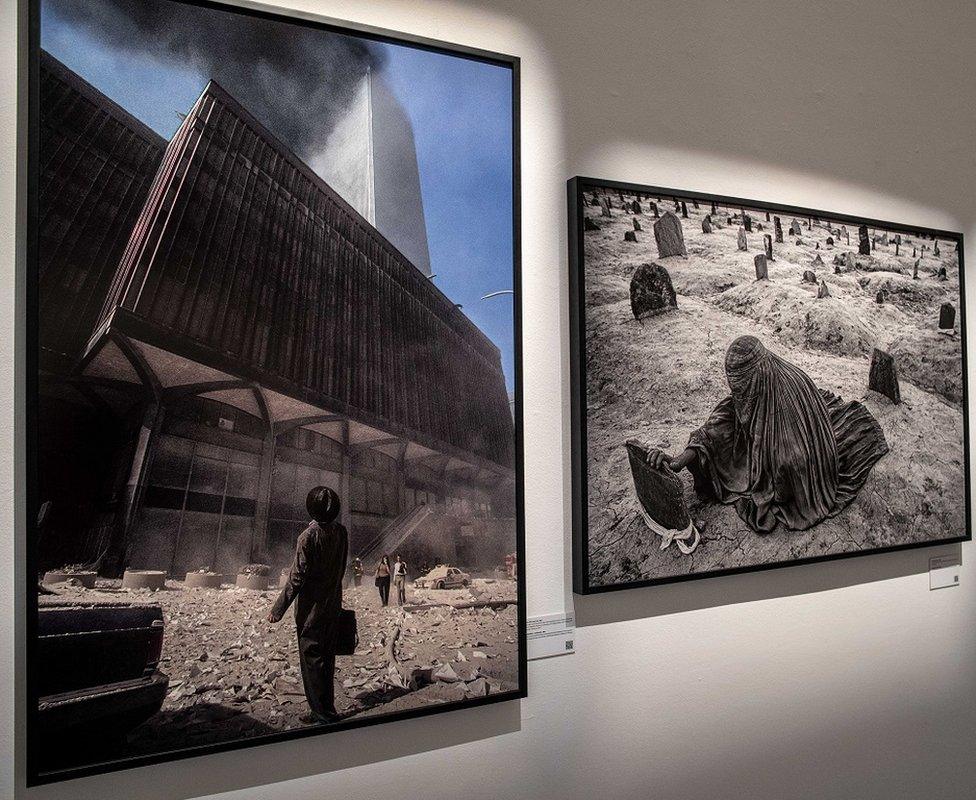 A photo of the 9/11 attack is displayed next to a photo from Afghanistan