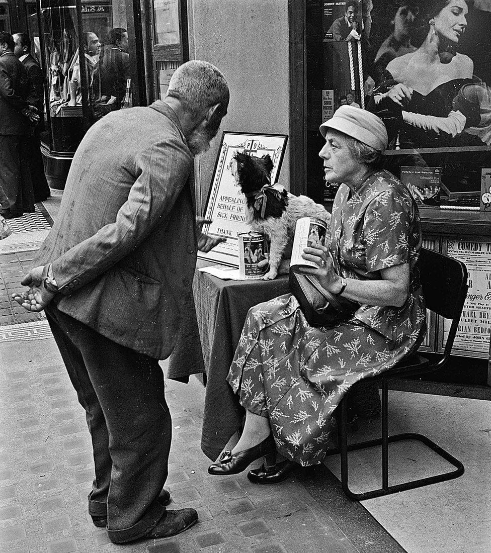 Woman collecting for the PDSA charity, Regent St, London 1955