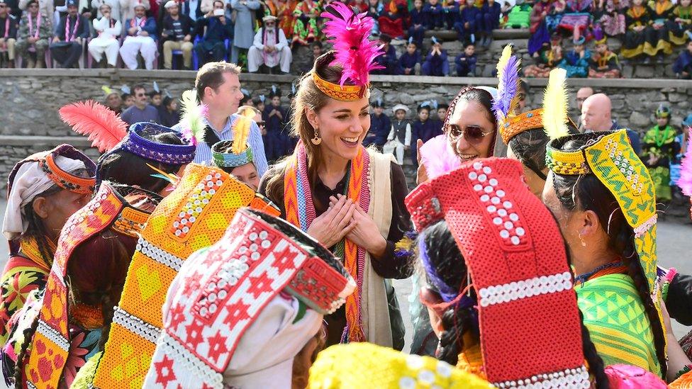 The Duchess of Cambridge meets women during a visit to a settlement of the Kalash people in Chitral