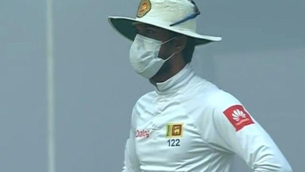 Sri Lanka captain Dinesh Chandimal wearing a mask while fielding against India in Delhi