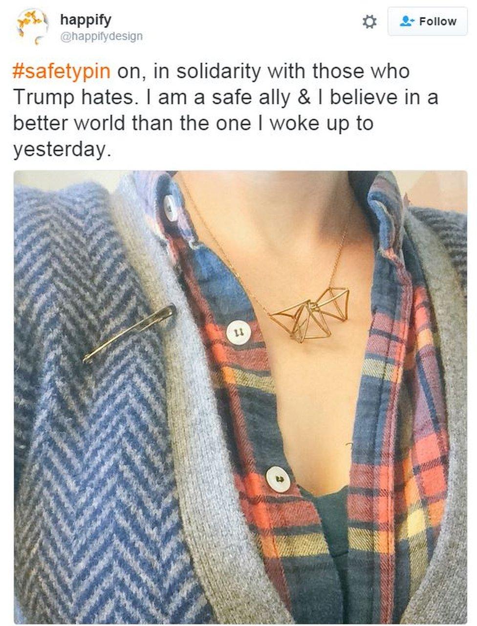 Tweet by user Happifydesign reads: "Safety pin on, in solidarity with those who Trump hates. I am a safe ally and I believe in a better world than the one I woke up to yesterday.