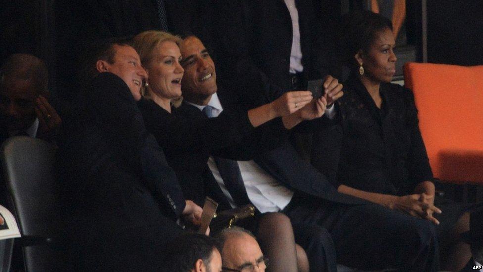 David Cameron, Barack Obama and Helle Thorning-Schmidt pose for a selfie at Nelson Mandela's memorial service